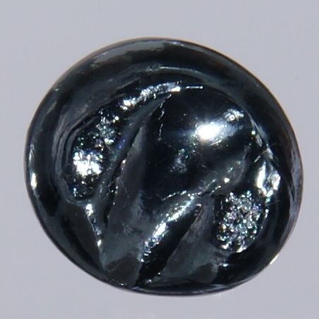 অসমিয়াম মৌলের প্রকৃত নমুনা